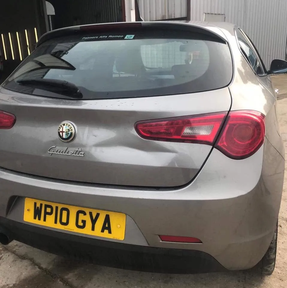 Alfa Romeo boot and rear quarter damage before repair at OH Works in Fairford