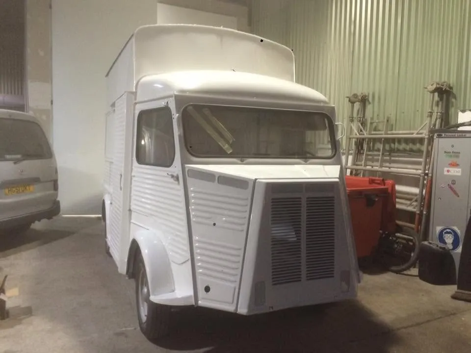 Restored classic Citroen van, front view, at OH Works in Fairford
