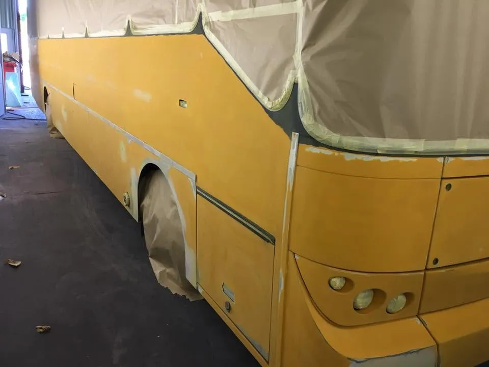 Yellow coach before respray at OH Works in Fairford
