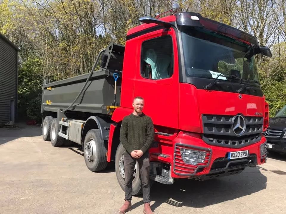Oakley from OH Works with a red Mercedes Arocs tipper resprayed at the Fairford workshop
