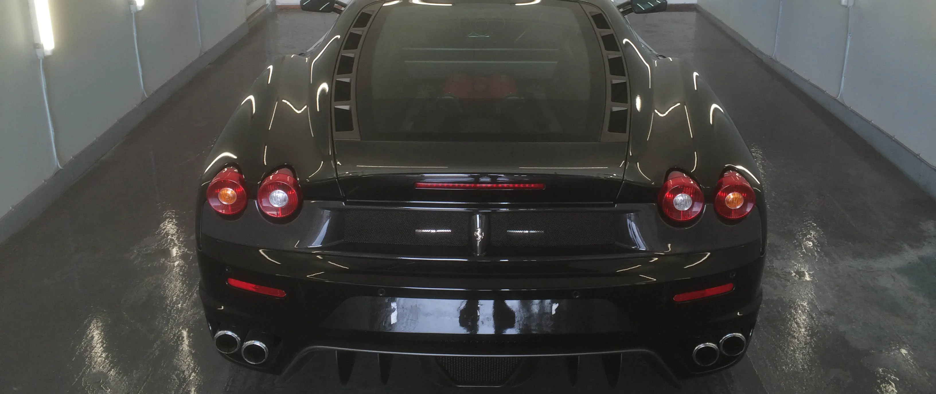 A Ferrari in the spray booth at OH Works