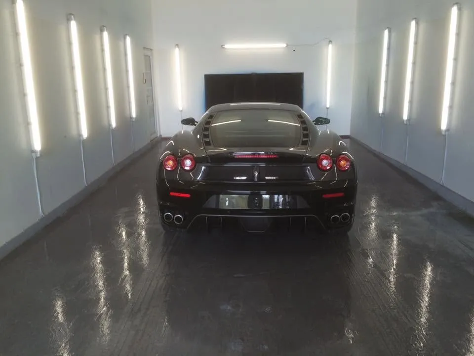 A Ferrari F430 finished in the spray booth at OH Works in Fairford